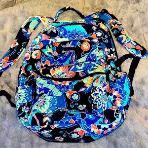 This is a backpack from Vera Bradley and has multiple pockets
